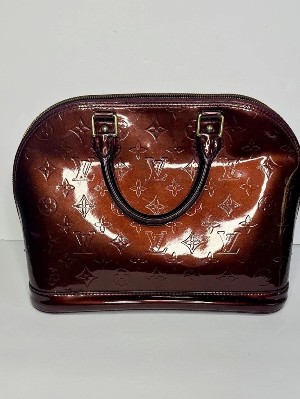 Louis Vuitton Alma PM Patent Monogram Satchel in Brown